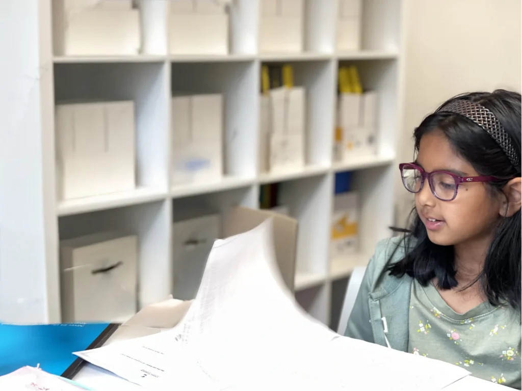 Pupil working through a practice paper