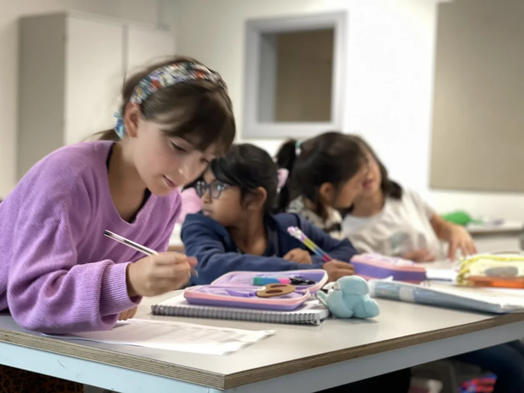 Pupils learning in a Pillai Tutors class